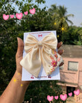 Cream colour medium size embroidery bow