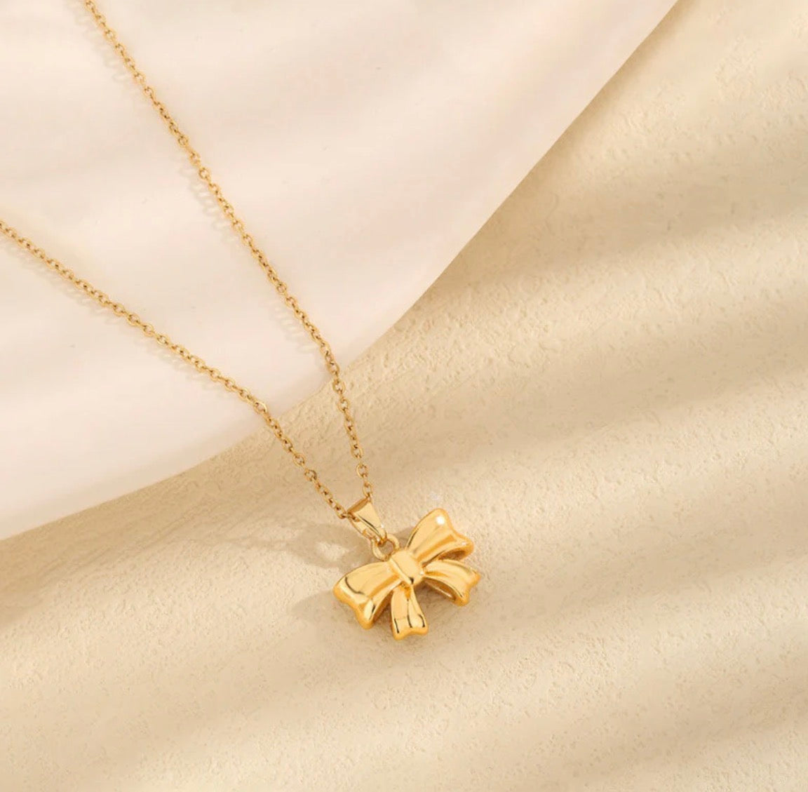 Anti - tarnish bow necklace